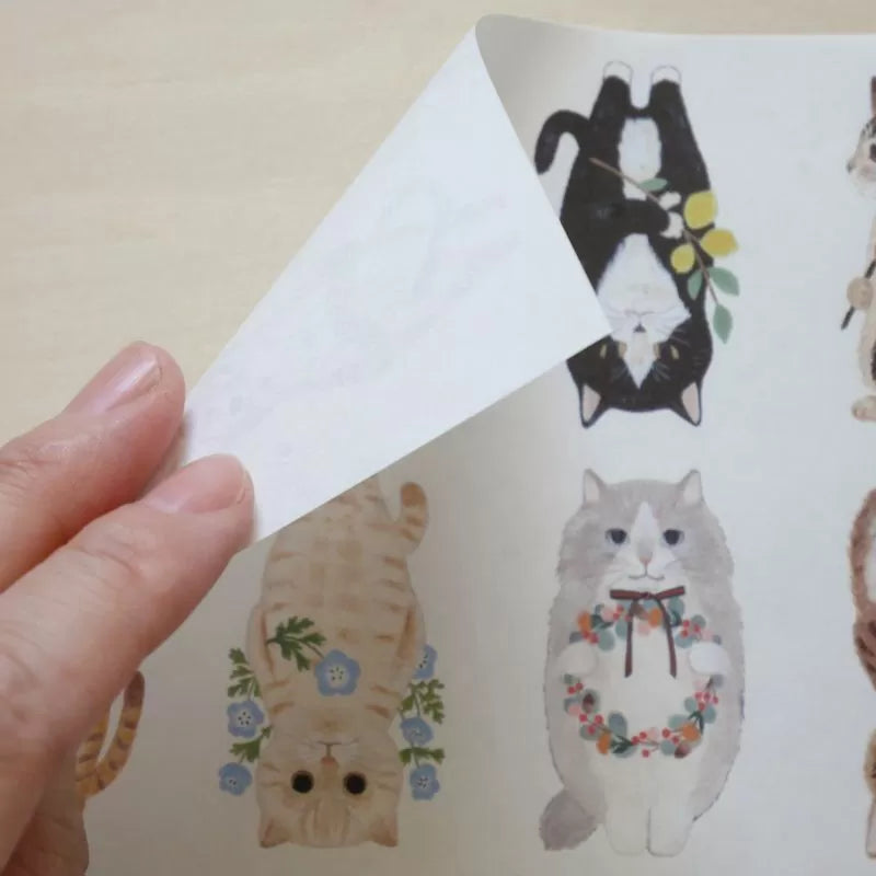 Featuring charming watercolor of different cats from Japanese illustrator 4legs.
This A4 sized paper set includes 20 sheets of paper with the same design featuring over 12 different cat drawings. Perfect to use as wrapping paper, making small bags, or using it as a book cover.
Contents: 20 sheets
Size: A4 size (210×297mm)
Paper type/thickness: About the thickness of copy paper