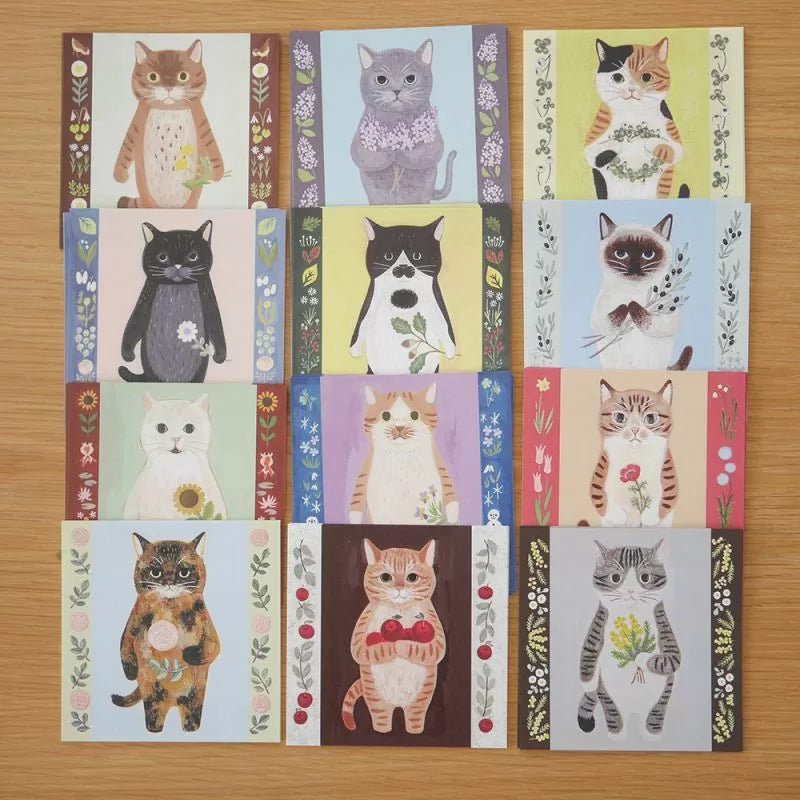 Featuring charming watercolor of cats with flowers and plants from Japanese illustrator 4legs
It is a convenient size that is not too big or too small. Please use it as a communication tool for small thank you and announcements. There are no lines on the front side, so you can use it freely as a shop card or business card with stamps and stickers as well as memos and letters. It is a great gift for people who like paper. The gorgeous and gentle designs will