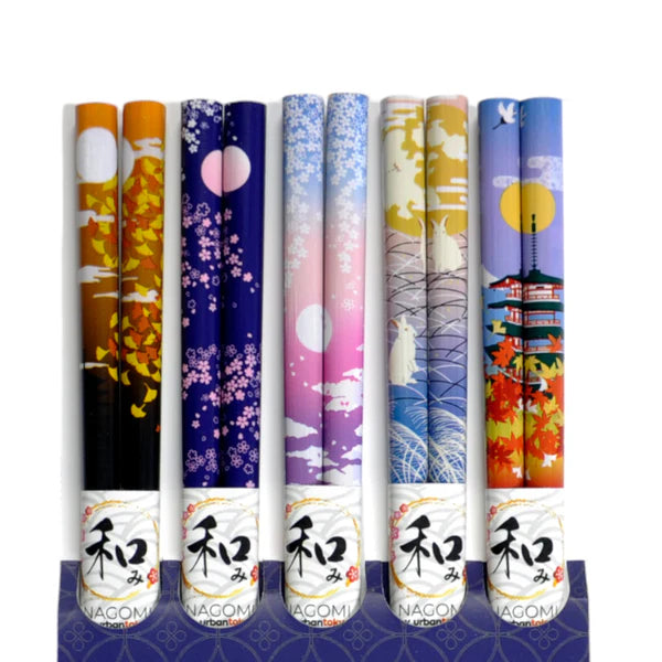 This set includes 5 sets of chopsticks with a red floral pattern inside a gift box.
Material: Bamboo
Size: 9"L
Origin: China