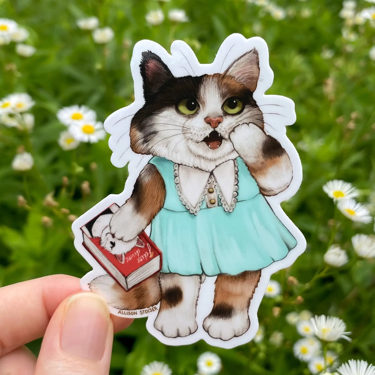 Allison Stoiser Art - Chick Lit Bookish Calico Cat Vinyl Sticker
This calico cat can't believe the shocking developments in the latest installment of the Feline Devine series. She stayed up all night reading it!