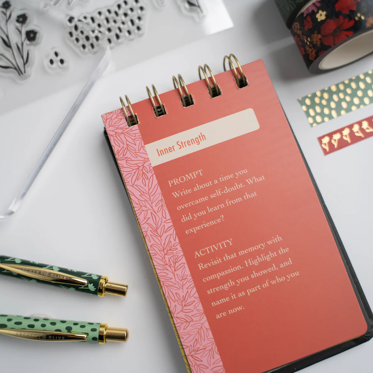 Nurture your creativity with the Flourish Self Care Box, a beautifully curated collection designed with mental wellness in mind. Designed with intention, this box brings together everything you need to begin (or return to) a meaningful creative practice.
Inside you will find:
A5 Bloom & Grow Notebook: featuring a full cover printed abstract floral design, hand stamped with gold foil accents on a vegan leather cover.
Writing Set: including a 0.5mm Ballpoint Pen and Mechanical Pencil with Eraser, both emb
