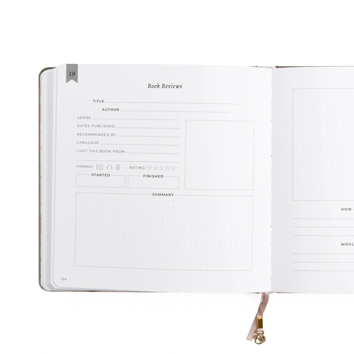 A dreamy Reading Journal in gentle lilac vegan leather, inspired by classic library bindings. Subtle geometric embossing frames a delicate open-book motif, creating a clean, elegant design that appeals to book lovers, writers, and everyday creatives.