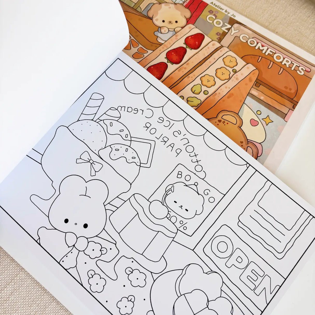 Atelier by Jo Coloring Book Vol. 1 - Cozy Comforts
Unwind and indulge in creativity with the Cozy Comforts Coloring Book – Volume 1 Revamp!
This beautifully refreshed edition features 30 original, full-page illustrations that celebrate the little things that make us feel warm, safe, and happy. Whether you’re curling up on a quiet afternoon or looking for a mindful break in your day, these cozy scenes invite you to relax, reflect, and color at your own pace.
˚ʚ♡ɞ˚ What to Expect:
☆ 30 original illustrati