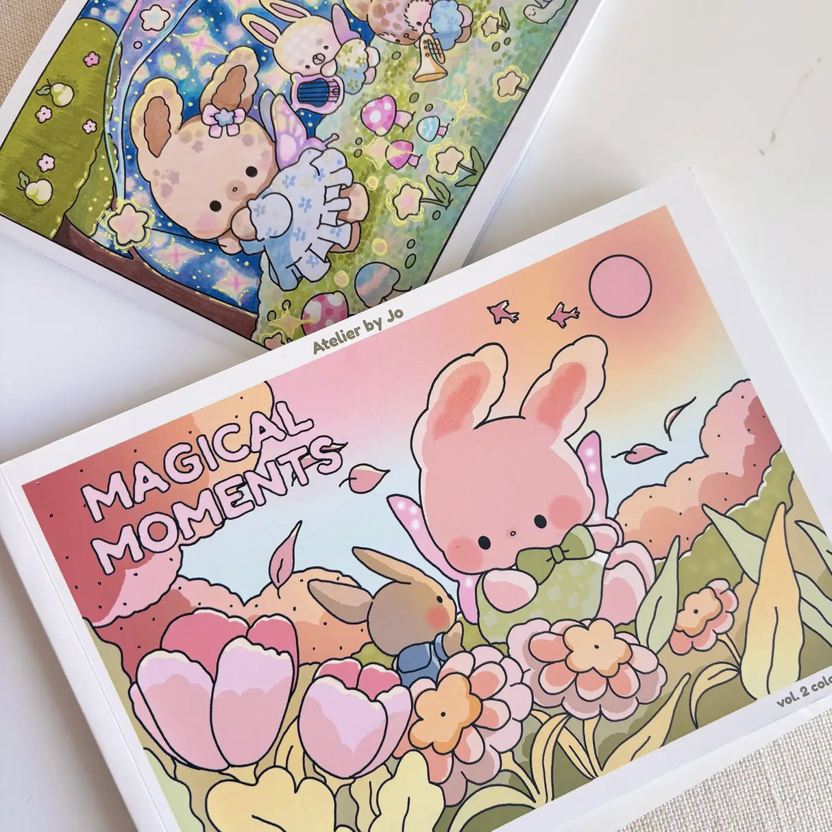 🌿✨ Wander into Whimsy with Magical Moments Coloring Book Vol. 2! ✨🌿
Step into an enchanted world where forest paths lead to secret hideaways and a little magic lingers in the air. Featuring 25 original, full-page illustrations, this collection invites you join Cotton and Pluto on their adventures into cozy woodland cottages, sparkling streams, and whimsical escapes hidden deep in the forests
Whether you're curling up on a quiet afternoon or seeking a mindful creative escape, these charming, nature-inspi