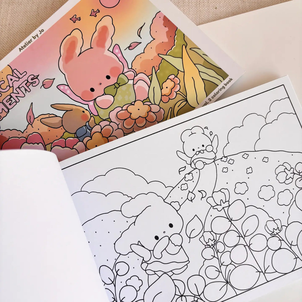 🌿✨ Wander into Whimsy with Magical Moments Coloring Book Vol. 2! ✨🌿
Step into an enchanted world where forest paths lead to secret hideaways and a little magic lingers in the air. Featuring 25 original, full-page illustrations, this collection invites you join Cotton and Pluto on their adventures into cozy woodland cottages, sparkling streams, and whimsical escapes hidden deep in the forests
Whether you're curling up on a quiet afternoon or seeking a mindful creative escape, these charming, nature-inspi
