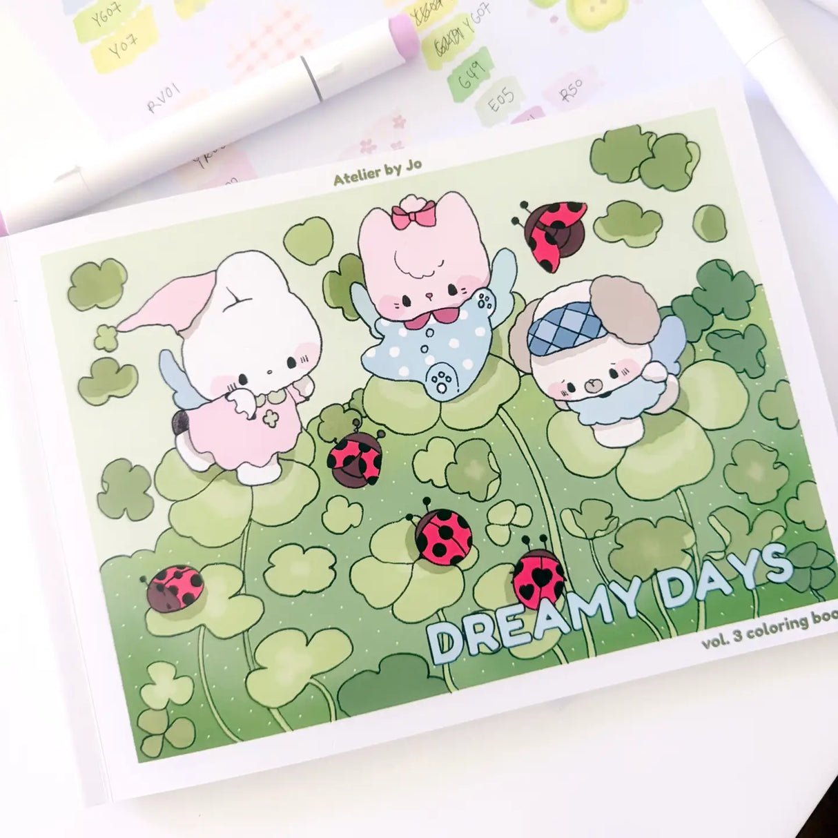 ππ Drift into a World of Dreamy Days with Coloring Book Vol. 3! π§΅β¨
Step into a playful little world stitched together with lucky ladybugs, vintage buttons, gingham bows, and cozy daydreams. Featuring 25 original, full-page illustrations, Dreamy Days Vol. 3 follows Cotton and Pluto through charming kitchens, clover-filled gardens, strawberry picnics, and delightfully kitschy corners overflowing with nostalgic treasures and cheerful details.
Inspired by retro trinkets, handmade keepsakes, and soft countr