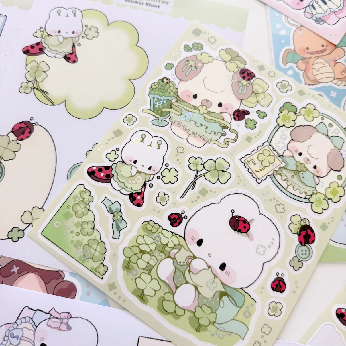 Atelier by Jo Large Sticker Sheet - Ladybugs and Clovers
Introducing larger stickers to be the center of focus in your journal spreads! These detailed, illustrated stickers will add a cozy flair to any journal.