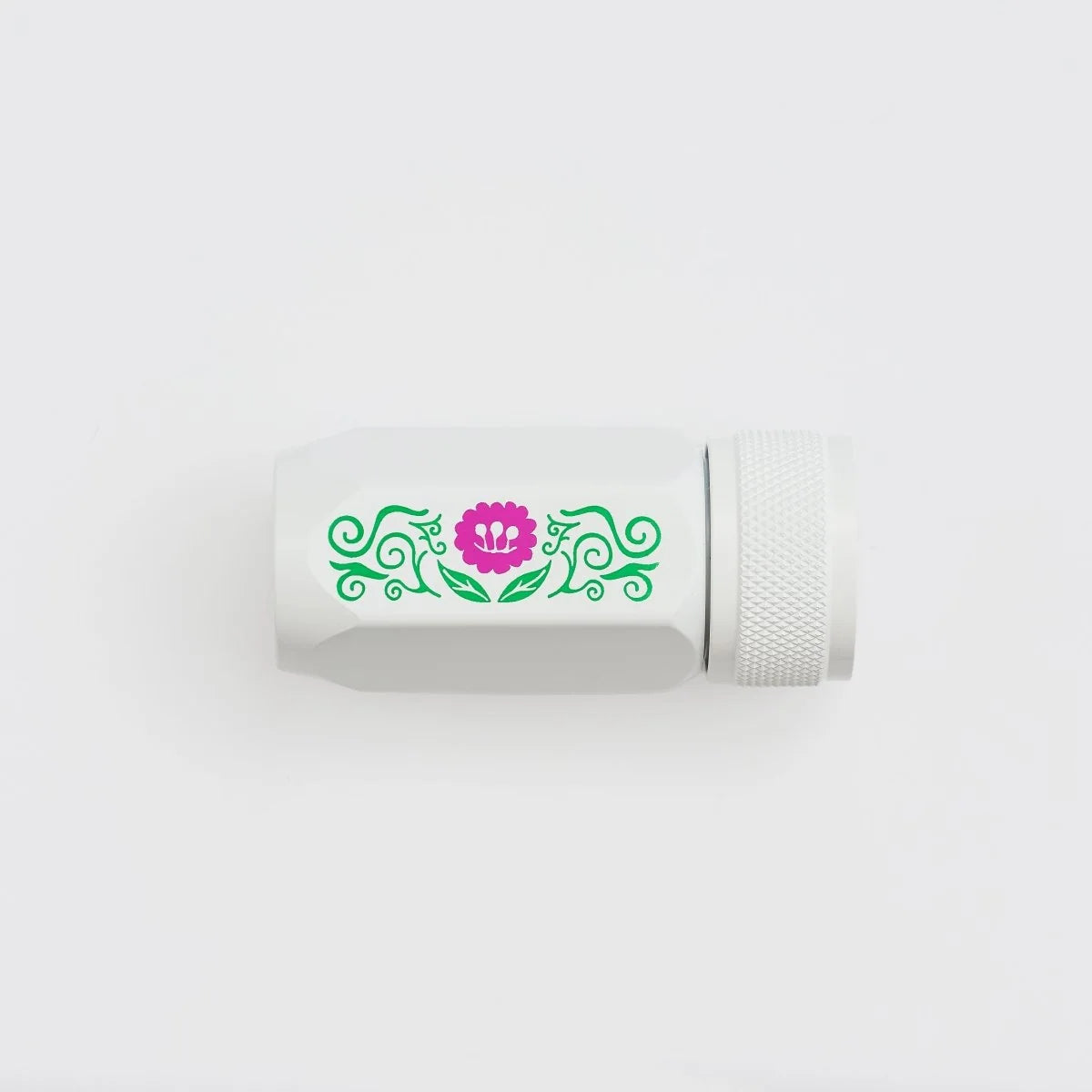 Volume 143 is our tribute to Frida Kahlo. The model number 143 is a nod to the 143 paintings commonly attributed to her over the course of her life.
This limited-edition Volume 143 Blackwing Long Point One-Step Sharpener comes in white with a Frida Kahlo-inspired floral design on the side. The sharpener body is made of durable, machined aluminum, and the sharpening unit features a premium German steel blade for consistent pencil sharpening. The canister can hold three fresh pencil sharpenings before needin