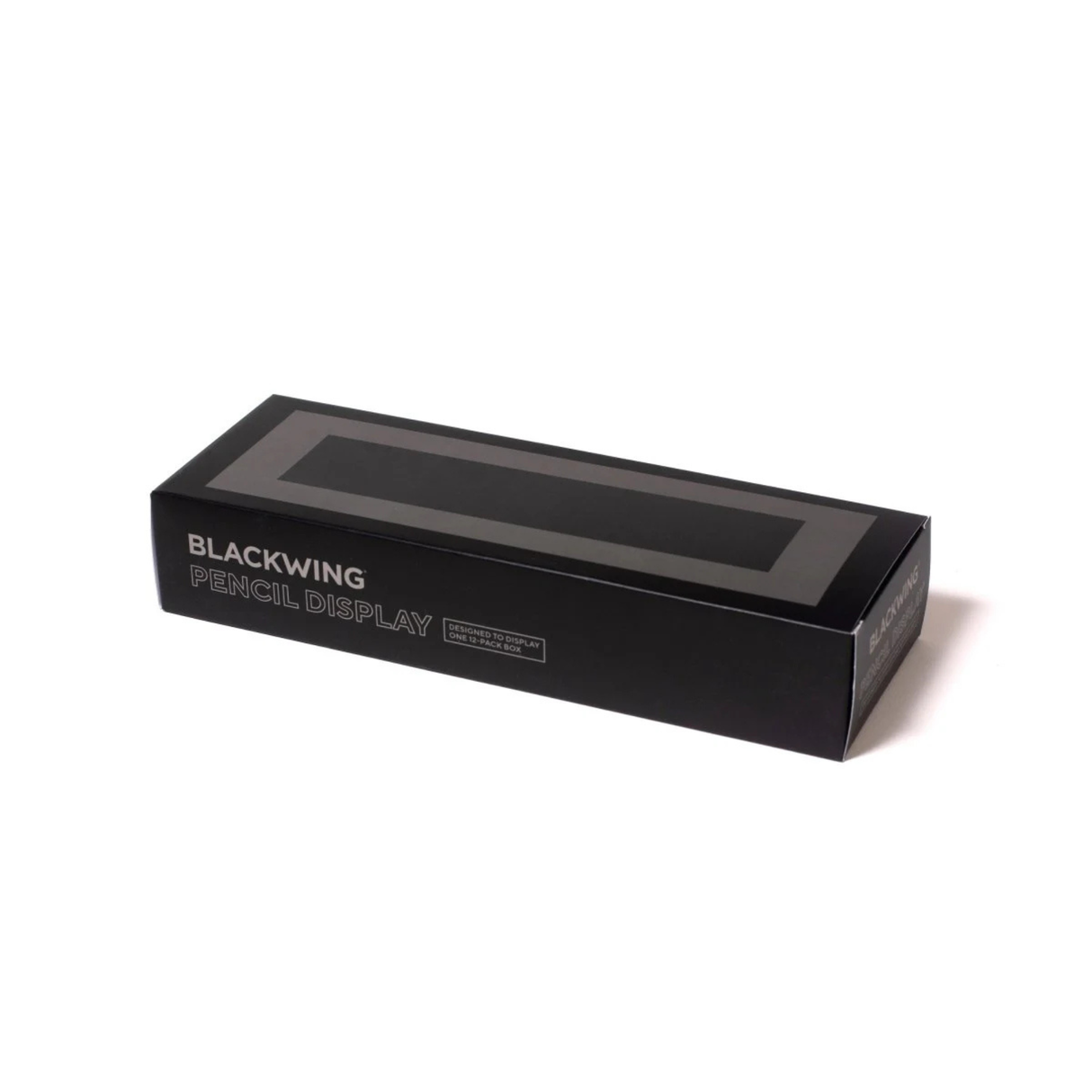 Put your favorite Blackwing 12-pack on display. This mahogany, solid wood pencil display is designed to showcase a single 12-pack Blackwing pencil box in a flat-lay position. Its clean, premium, and minimalist profile fits perfectly on every desk, shelf, or wall using the predrilled mounting holes. The Blackwing logo is engraved on the side.
The Blackwing Flat Box display measures 9.8125 x 3.25 x 1.75 inches.