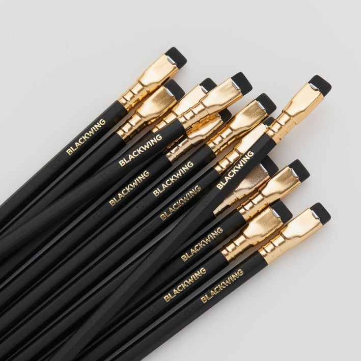 The Blackwing Matte pencil is ideal for drawing, music writing, woodworking, and anyone who prefers a soft, dark line. The Blackwing Matte contains the same soft graphite formulation as the since renamed "Blackwing Palomino."This graphite pencil glides effortlessly for bold shading and smooth writing. Available in Black, Green, and Red.
Blackwing Matte pencils come in a 12-pack gift box that doubles as a pencil cup. Features a Graphite Identification Stamp indicating its "SOFT" graphite core.
All Blackwin