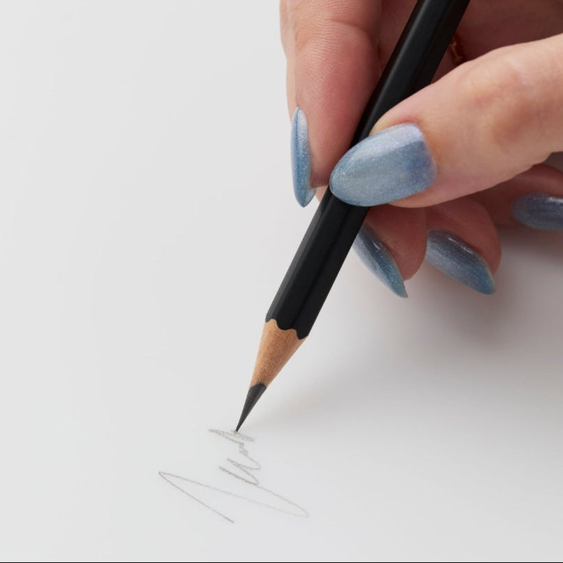 The Blackwing Matte pencil is ideal for drawing, music writing, woodworking, and anyone who prefers a soft, dark line. The Blackwing Matte contains the same soft graphite formulation as the since renamed "Blackwing Palomino."This graphite pencil glides effortlessly for bold shading and smooth writing. Available in Black, Green, and Red.
Blackwing Matte pencils come in a 12-pack gift box that doubles as a pencil cup. Features a Graphite Identification Stamp indicating its "SOFT" graphite core.
All Blackwin