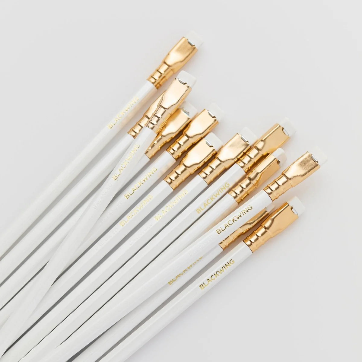 A favorite of calligraphers and illustrators, the Blackwing Pearl pencil includes a balanced and smooth graphite core that is softer than the graphite found in the Blackwing 602 but firmer than the graphite found in the Blackwing Matte. Perfect for daily writing, journaling, and sketching. Each pencil features a pearlescent white, pink, or blue finish, our iconic square Blackwing ferrule, and a replaceable eraser.
Blackwing Pearl pencils come in a 12-pack gift box that doubles as a pencil cup. 