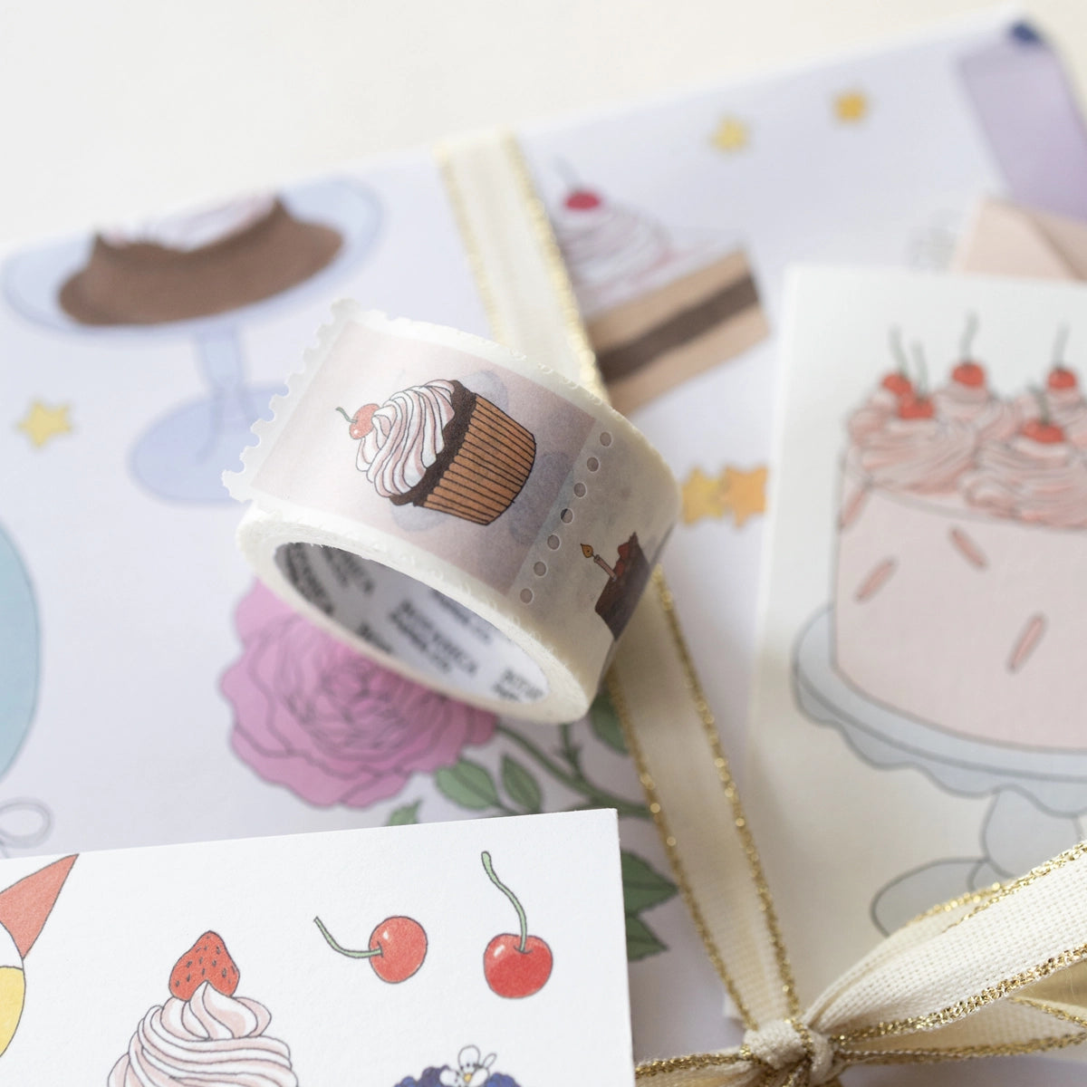 Illustrated adhesive paper tape inspired by vintage stamps.
Perfect for decorating your mail, journals, cards, gift tags, scrapbook projects, and more.
Perforated washi tape, 7 different designs on repeat.