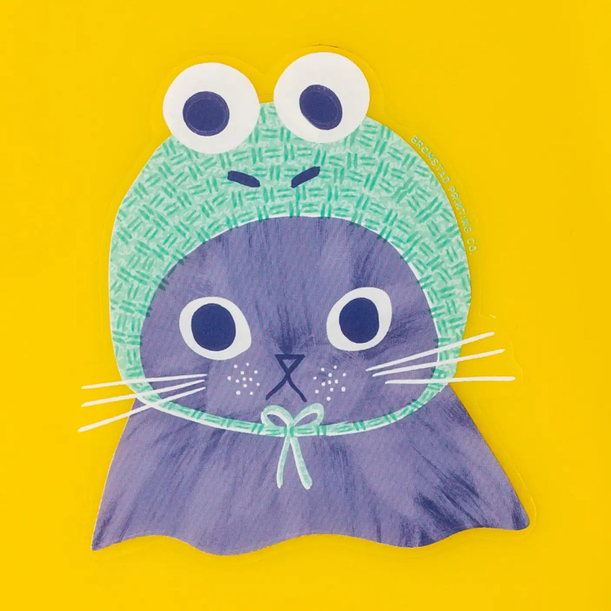 Bromstad Printing Co. - Frog Hat Cat Clear Vinyl Sticker
Can a cat croak? This kitten might! He wears a cozy knitted frog hat atop his cute kitten head. This 3" clear sticker is purrfect for adorning water bottles, laptops, and more. Drop one in an envelope along with a card as a little treat.
Waterproof
3x3