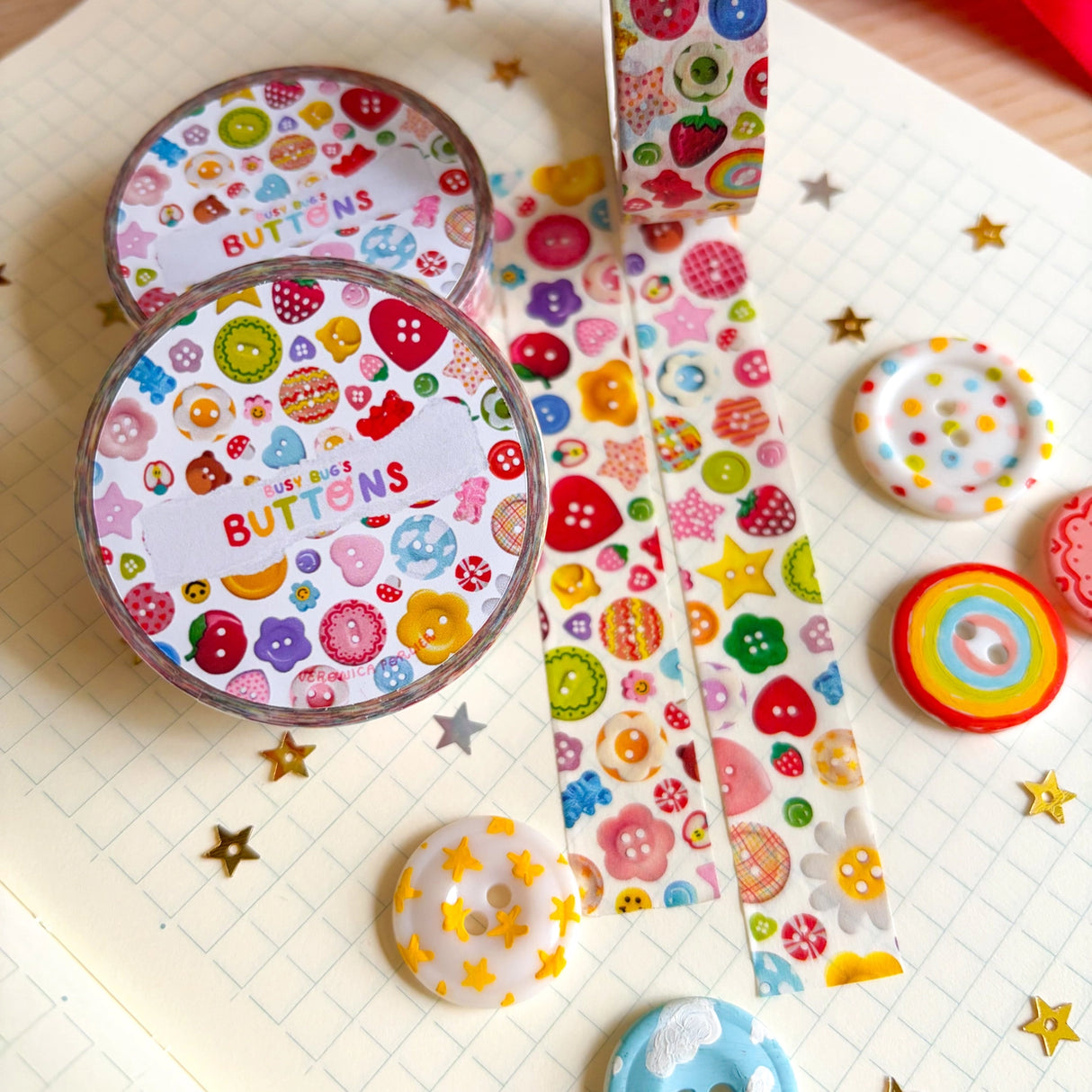 Add some color to your journal and crafts with this cute button themed washi tape designed by Veronica! This washi tape includes buttons hand-painted by Veronica and from her personal collection!
Perfect for crafts, journaling, snail mail, and more.
Size: 15mm x 10m