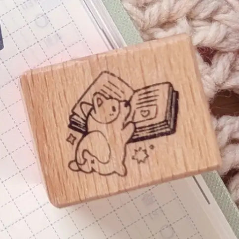 A small wood stamp of a little literary puppy for your planner and scrapbooking needs. Each stamp measures approximately 1 x 0.75 inch.
Stamps come loose and without any extra packaging.