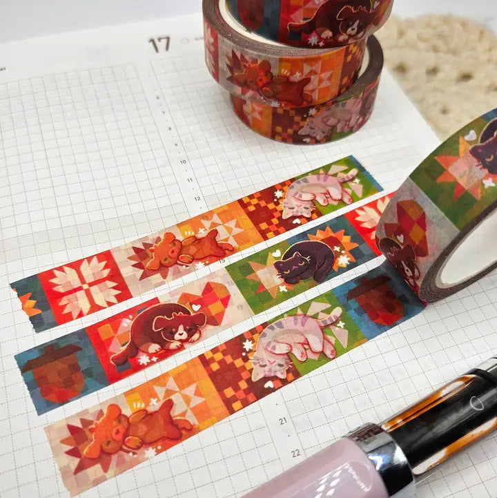 A washi tape inspired by naps on some cozy quilts! Each roll of washi tape is 15mm (approximately 0.59 inches) wide and 10 meters (approximately 10.9 yards) long.
Washi tapes have a small labeling sticker with branding and design, but without extra packaging.