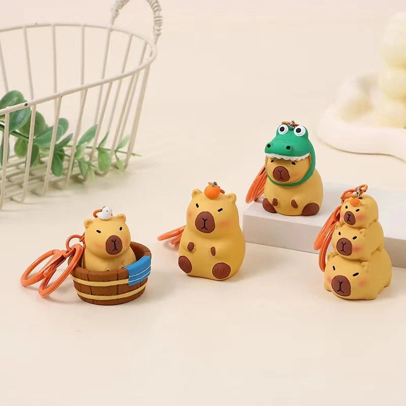 This adorable keychain adds personality wherever you go, whether clipped to your keys, bag, or backpack. Cute, lightweight, and easy to gift, it’s perfect for anyone who loves whimsical accessories or capybara-themed goodies.
Approx 2in x 2in
Includes 1 keychain 