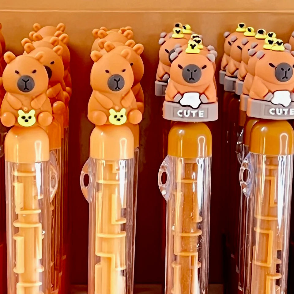 These cute capybara maze gel pens are perfect for planning, for work, home, desk or for school. They will be a beautiful and fun addition to your pen collection!
• 0.5mm Gel Ink
• Black Ink
• Writes very smoothly
• Measures approx. 6" - 7"
• Includes 1 pen, we will send one random color/design