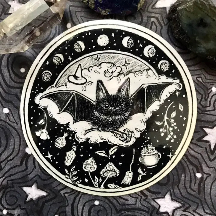 Follow the phases of the moon with a little bat to guide your path!
Includes 1 vinyl sticker
Dimensions: 4"
Dishwasher Safe and Water resistant
Perfect for water bottles, laptops, folders and more!
