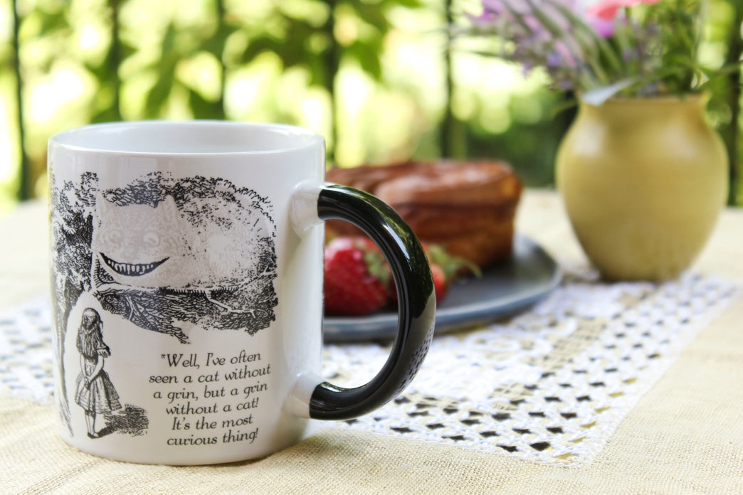 Taza de café que cambia de temperatura con el gato de Cheshire