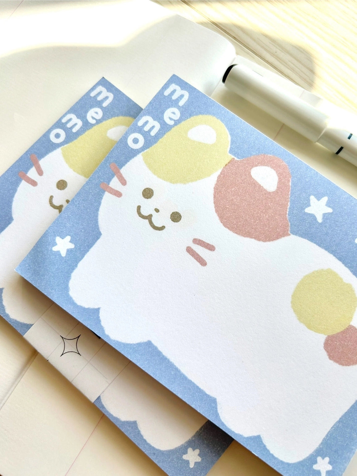 Chocolett - Kitty Memo Pad
This memopad comes with 50 thick pages and measures 5.5 x 4 inches big. It’s cutely decorated with a giant kitty for all your notes and memos.
Please note that these are not sticky notes.
Includes 1 memo pad
