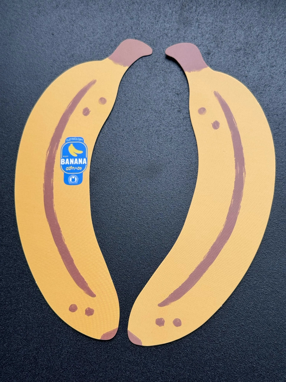 Banana Bookmark by Clem & Co.
It’s bananas to not want a bookmark this cute! It truly a-peels to anyone who reads a bunch of books!