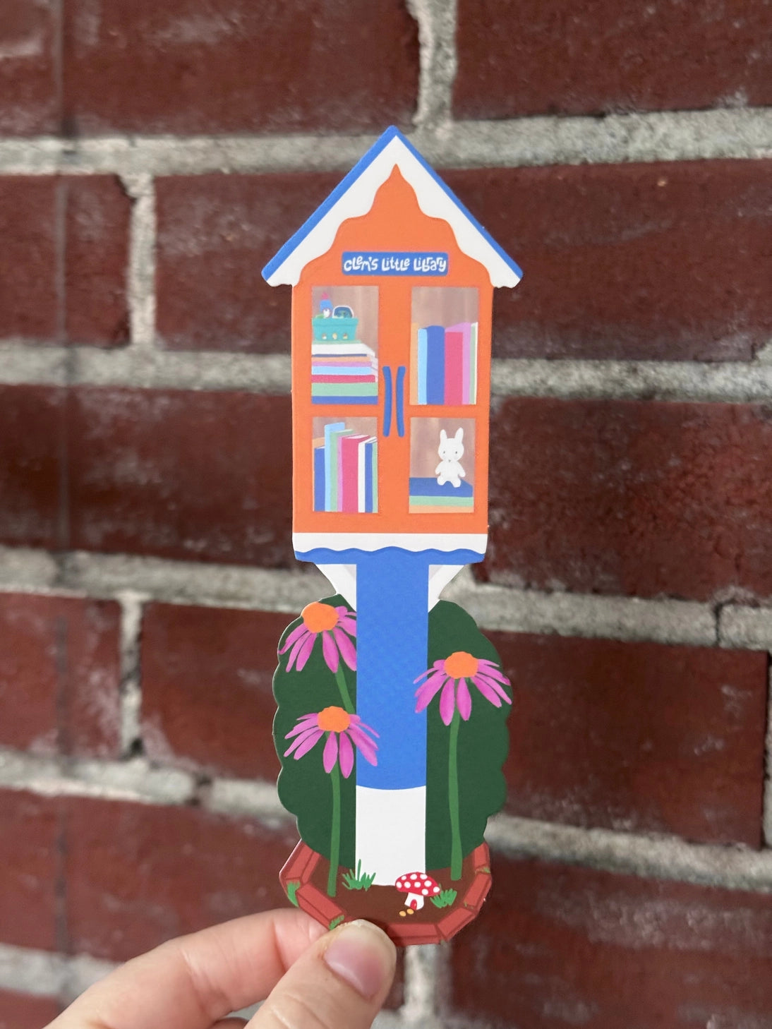 Little Library Bookmark by Clem &Co.
If you have ever passed a Little Free Library, you know how great of a resource they are for making knowledge accessible. Clem the Bunny put together her own Little Free Library and loved it so much she turned it into a bookmark!