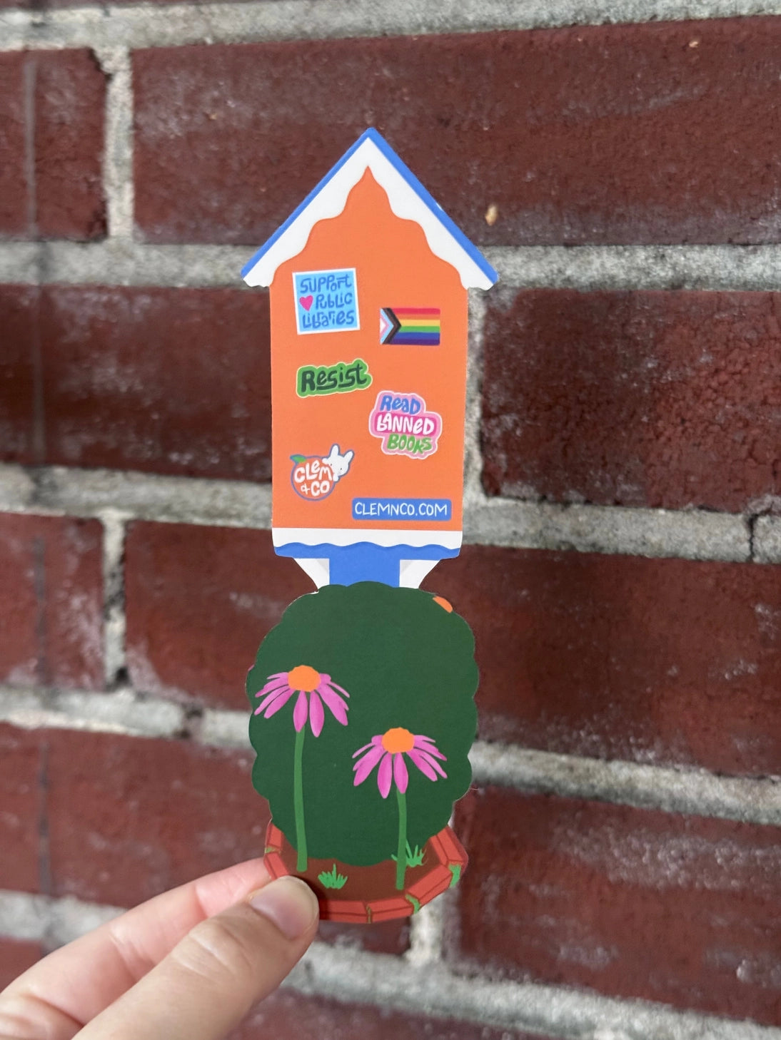 Little Library Bookmark by Clem &Co.
If you have ever passed a Little Free Library, you know how great of a resource they are for making knowledge accessible. Clem the Bunny put together her own Little Free Library and loved it so much she turned it into a bookmark!