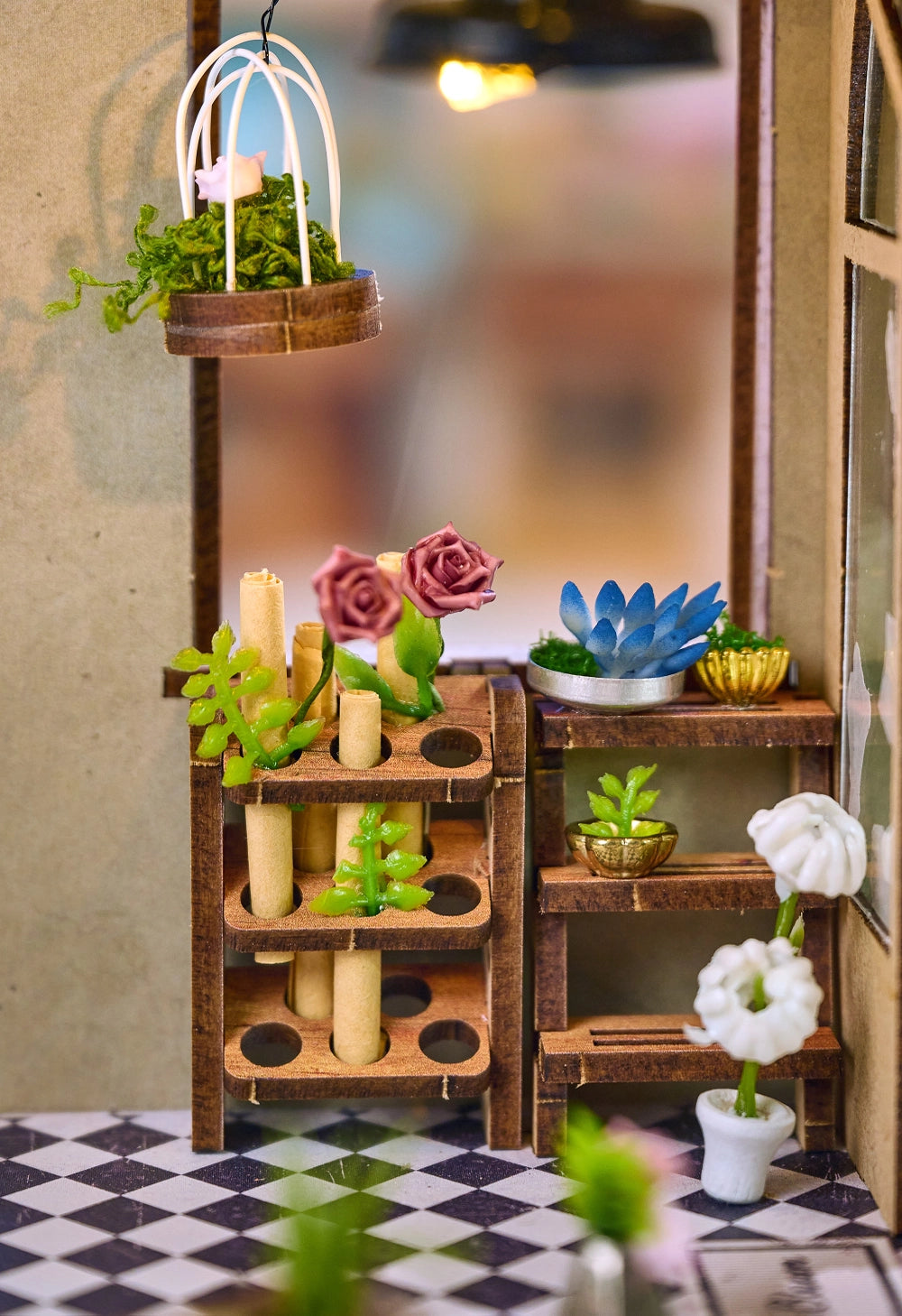 Step inside The Flower Shop, a cozy miniature haven where vibrant flower arrangements bloom in elegant vases, lush potted plants thrive, and fresh bouquets overflow with color. This delightful build features classic red brick walls, a welcoming wooden arched doorway, and a checkerboard floor that adds timeless charm.
2 AAA batteries required; batteries are not included.
Ages 14+
248 pieces
Assembled size: 4.53 x 3.94 x 7.4 inches