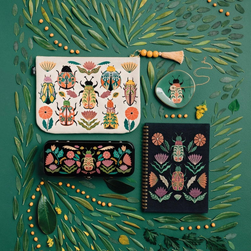 Place your treasured possessions under the protection of ancient enchantments with our Large Amulet Zip Pouch. Opulently embellished scarab beetles and potent herbal blooms promise immunity from danger, providing you with priceless peace of mind.
• Size: W9.75 x L7in
• Material content: 100% Cotton, Polyester Embroidery
• Care instructions: Spot clean only