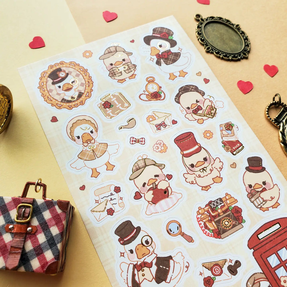 STICKII - Darling British Ducks Sticker Sheet
🎩 🦆 Ready for a quacking good time? Prepare to be charmed by this delightful flock of ducks, dressed to impress in impeccable British-inspired vintage outfits. From deerstalker hats to dapper capes, fancy top hats to adorable bow ties, these feathered friends will add a splash of British charm to any page they waddle onto.
Top Coating: Gold foil
Adhesive Layer: Paper
Backing Layer: Paper
6.69" x 3.54".
Weight - 0.03lbs.
1 sheet included 