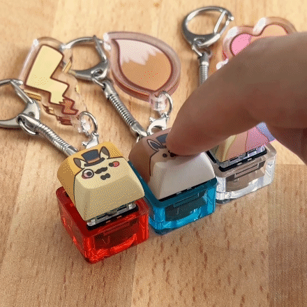 Dead 'Possom Clicky Keychain
Have you ever wanted to type on a keyboard without actually being productive? Then these are the keychains for you! The Blue Gateron switch was chosen specifically for the satisfying clicky sound and tactile feel of a mechanical keyboard. Each keychain also comes with a custom keycap and bonus tail charm.
Want a quieter switch or want to use your keycap for your keyboard? Keychains are packaged unassembled, so you can customize your keychain to your liking!
APPROX. SIZE: 