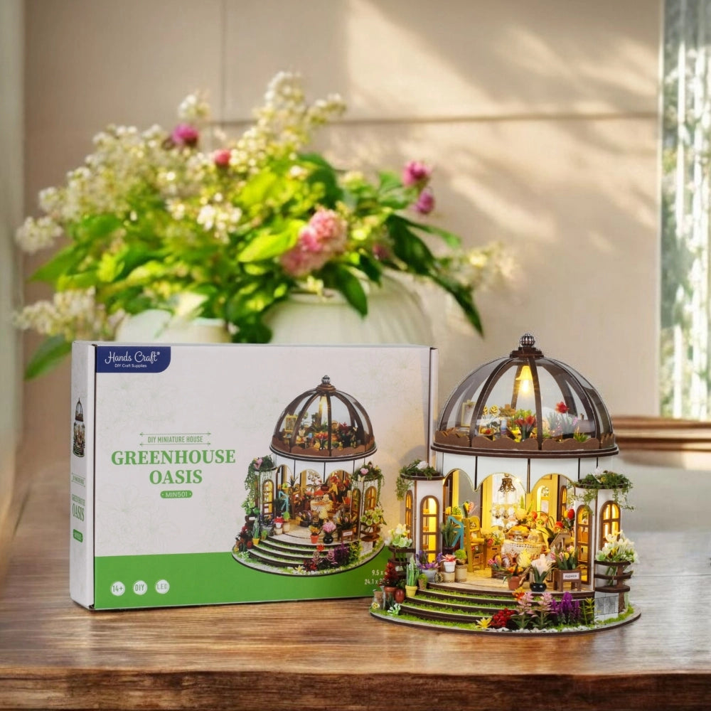 Step into a tranquil garden escape with this miniature kit-a sun-drenched sanctuary filled with flourishing plants, rustic charm, and peaceful vibes. This beautifully crafted greenhouse-style gazebo features delicate woodwork, glass-like panels, and an inviting open-air design surrounded by vibrant flowers, climbing vines, and cozy garden furniture. Whether you're dreaming of a relaxing afternoon under the sun or a quiet place to sip tea and tend to your plants, this miniature brings that dream to life-one