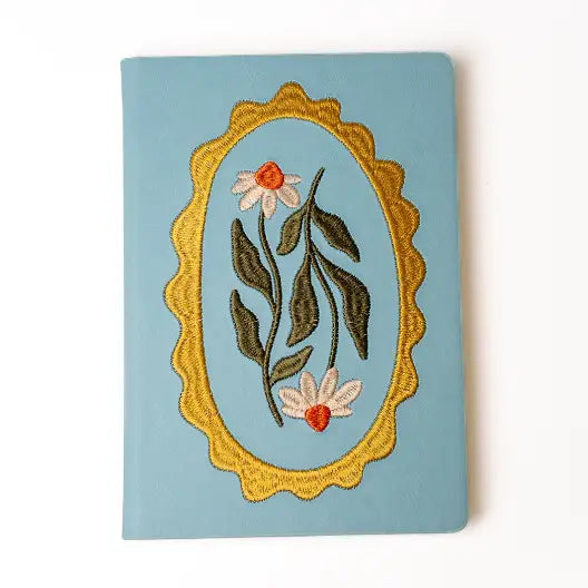 Embroidered Daisy Frame Hardbound Notebook
A premium hardcover notebook featuring precision embroidery on a vegan leather cover. Designed for everyday use, it includes smooth-lined pages, a Smythe-sewn layflat binding for effortless writing, and a satin ribbon to mark your place.
New inside page design
Soft Touch Embroidered Hardcover
5.75" x 8.25"
144 Lined Pages
Contrast Endpages
Satin Ribbon Bookmark & Pen Loop