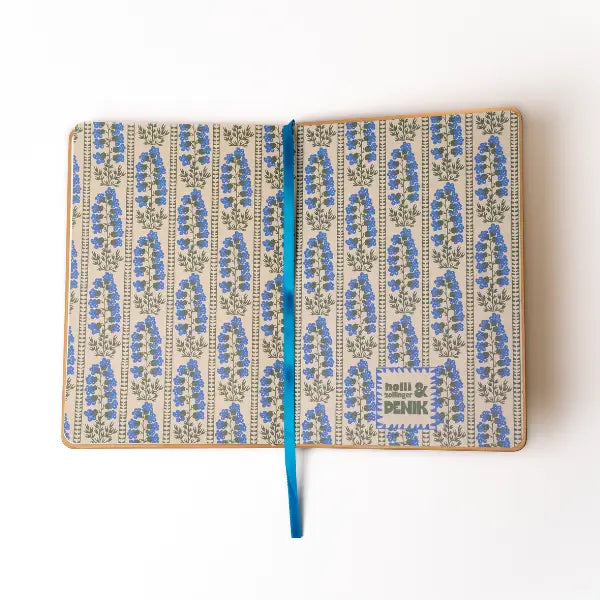 Embroidered Delphinium Flower Hardbound Notebook
A premium hardcover notebook featuring precision embroidery on a vegan leather cover. Designed for everyday use, it includes smooth-lined pages, a Smythe-sewn layflat binding for effortless writing, and a satin ribbon to mark your place.
New inside page design
Soft Touch Hardcover
5.75" x 8.25"
144 Lined Pages
Contrast Endpages
Satin Ribbon Bookmark & Pen Loop