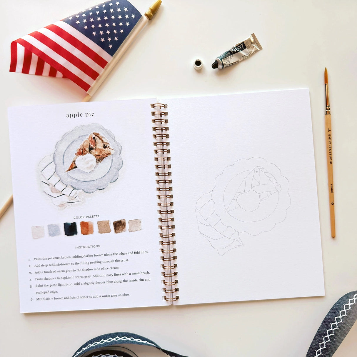Twelve illustrations of flags, stars, and classic summer scenes — each pre-outlined with step-by-step instructions. Paintings take about thirty minutes from start to finish, making it approachable for first-time painters and a favorite for gifting.
A timely release for America's 250th anniversary in 2026. A strong May–July seller and a natural fit for home, gift, and patriotic-themed boutiques.
12 beginner-friendly illustrations
Thick 120lb watercolor paper
Lay-flat pages with spiral binding for has
