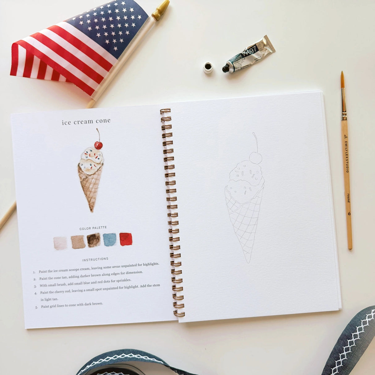 Twelve illustrations of flags, stars, and classic summer scenes — each pre-outlined with step-by-step instructions. Paintings take about thirty minutes from start to finish, making it approachable for first-time painters and a favorite for gifting.
A timely release for America's 250th anniversary in 2026. A strong May–July seller and a natural fit for home, gift, and patriotic-themed boutiques.
12 beginner-friendly illustrations
Thick 120lb watercolor paper
Lay-flat pages with spiral binding for has