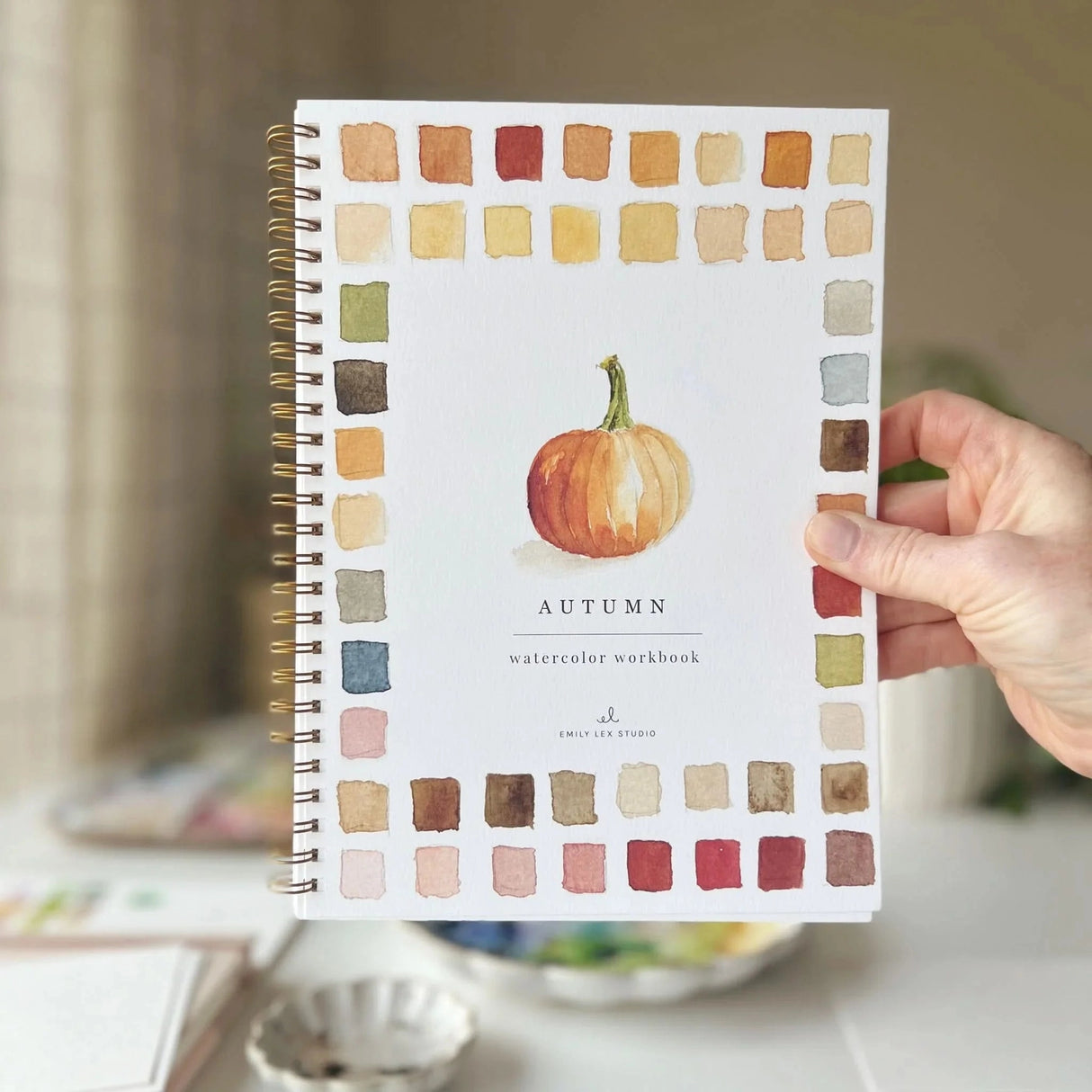 Twelve autumn illustrations — a pumpkin, squirrel, fall leaves, vintage truck, mum bouquet, fall wreath, and more — each pre-outlined with step-by-step instructions. Paintings take about thirty minutes from start to finish, making it approachable for first-time painters and a favorite for gifting.
12 beginner-friendly illustrations
Thick 120lb watercolor paper
Lay-flat pages with spiral binding for hassle-free painting and easy tear-out
Lightly outlined sketches to guide you
Easy to carry