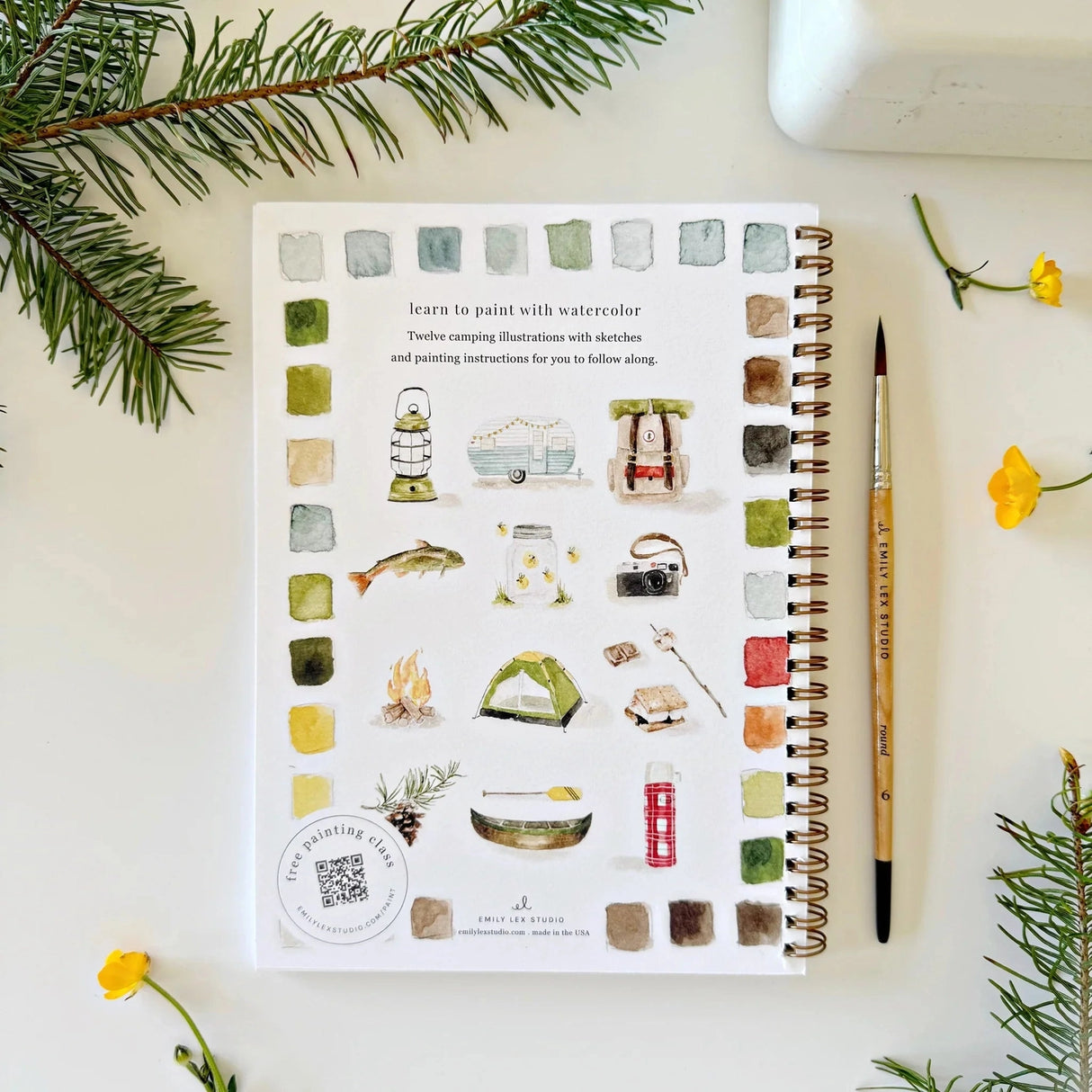 Twelve camping illustrations — a vintage camper, lantern, campfire, tent, canoe, s'mores, and more — each pre-outlined with step-by-step instructions. Paintings take about thirty minutes from start to finish, making it approachable for first-time painters and a favorite for gifting.