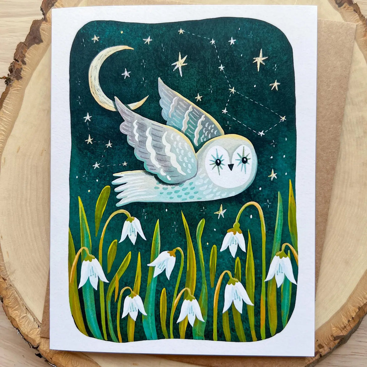 Emmylou Illustrations - Owl Greeting Card
Blank greeting card featuring a cute owl, snowdrop flowers, moon and stars. Perfect for anniversaries, birthdays, or just because! All greeting cards are hand illustrated by me!
Printed on premium heavyweight matte cardstock, this A2 card is blank inside—ready for your handwritten notes.
Includes a kraft envelope