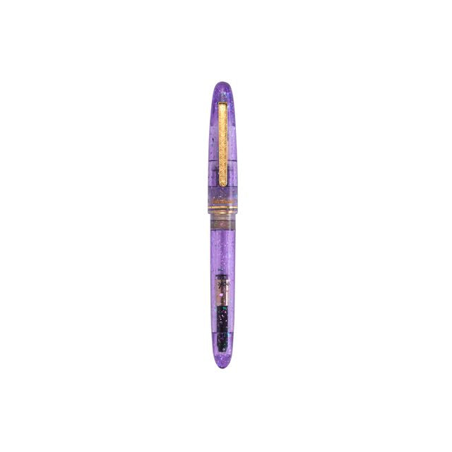 Esterbrook x Sakuradragon Sakura Street Estie Fountain Pen
Created with artist Cindy Duong of Sakuradragon, the Sakura Street Estie brings her imaginative illustrated world to Esterbrook's traditional Estie fountain pen. Its U.S.-blended material combines translucent purple with colorful glitter sparkle, while the custom clip is etched with Cindy's Sakura pattern. Dual Esterbrook and Sakuradragon engraving and a gold-plated converter finish the design. Each pen arrives in special packaging with Japanese gi