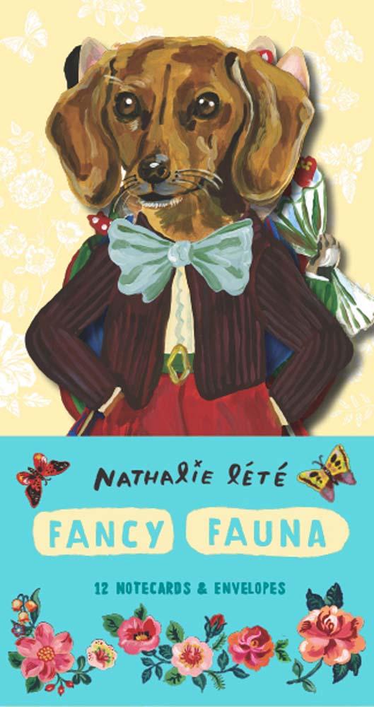 These 12 die-cut cards from Paris-based artist Nathalie Lété are all dressed up and ready to go! Featuring delightful paintings of dapper dogs and cute cats bearing gifts and flowers, these cards will suit all fancies—and occasions.
BELOVED FRENCH ARTIST: Nathalie Lété's distinct aesthetic has attracted a strong worldwide following. She works in a variety of mediums, including illustration, painting, ceramics, and textiles.
