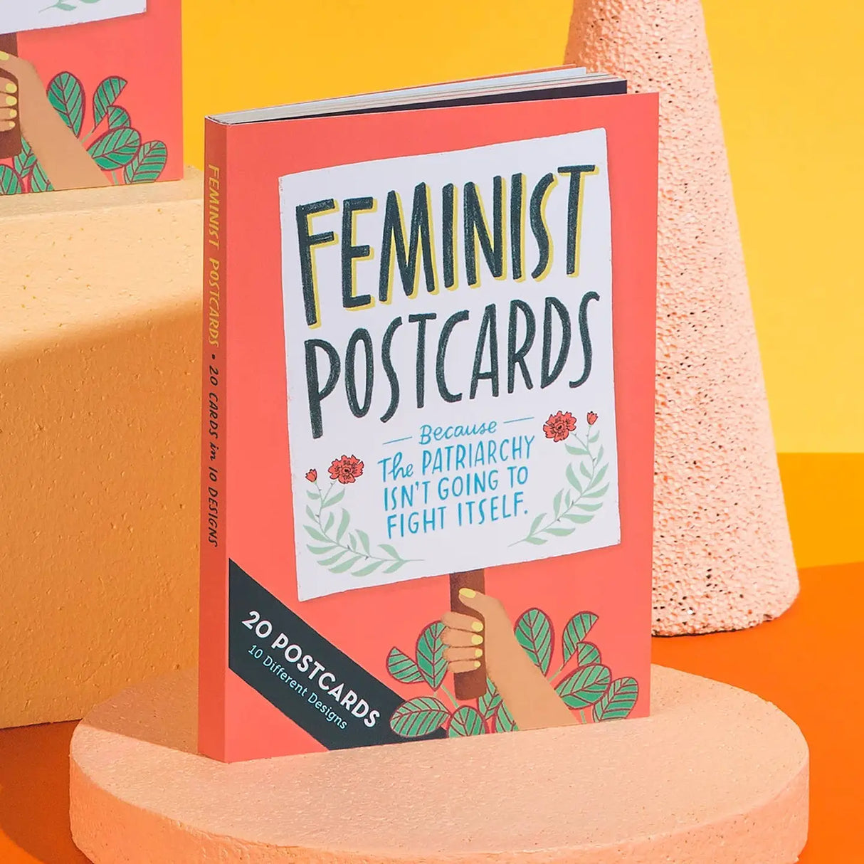 Give the grown-ass ladies and badass girls in your life a boost of feminist fire with this postcard book (20 cards, 10 designs). And if you’re the type to send postcards to politicians, these are sure to send a message: The future is feMAIL. (Sorry, we had to make that joke.)
Twenty extra-large 5" x 7" postcards with card stock cover
2 each of 10 different designs (20 total postcards)