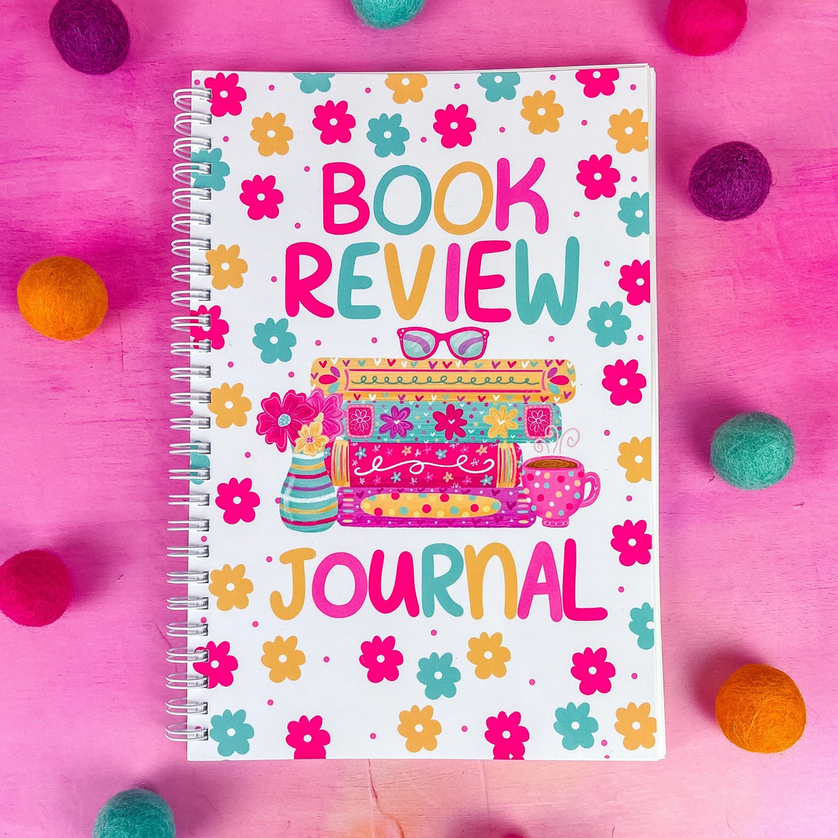 Keep track of your book reviews with this cute book review journal. There are 100 pages for different book reviews. Each review page includes the Title, Author, Start and Finish Dates, Star Rating, Favorite Quote area and your Review!
*DETAILS*
Size: 6x9"
Paper: 80lb interior paper
Wire coil binding
Gloss laminate cover