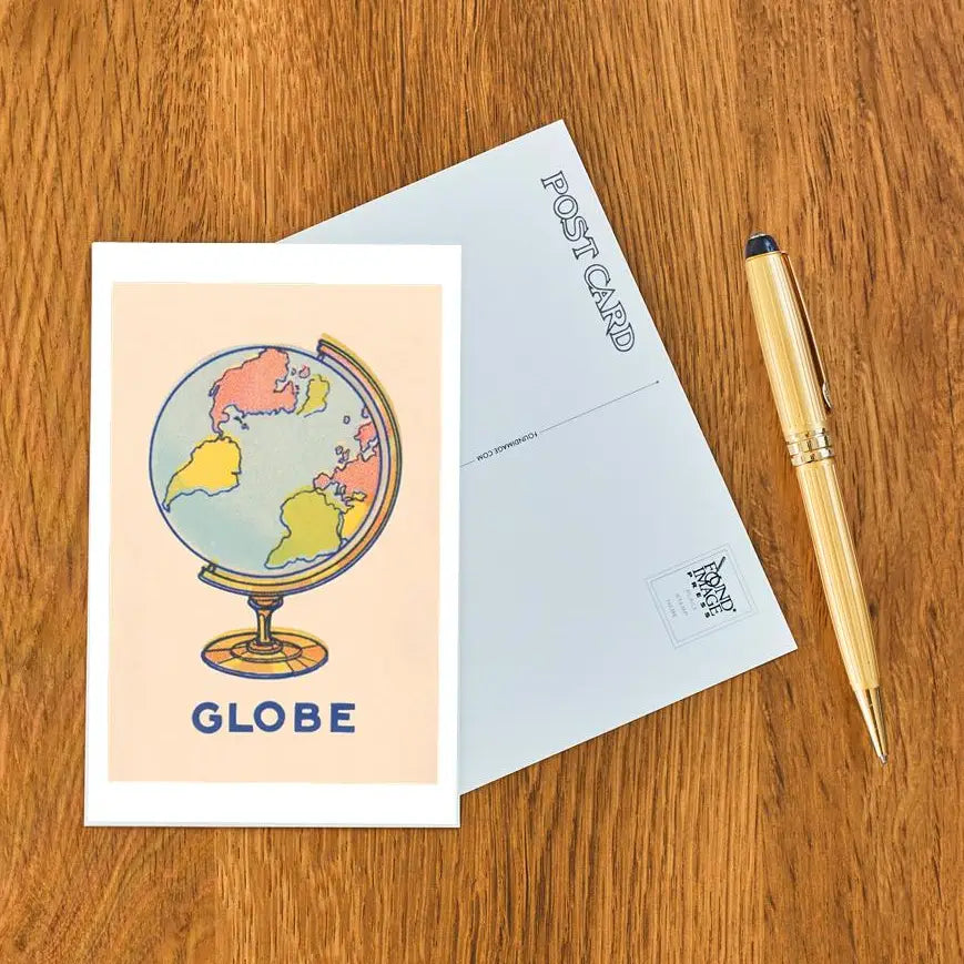 Found Image Press - Globe Postcard
Elevate your inventory with this classic 3.5" x 5.5" postcard featuring an image from our Kid Stuff collection titled Globe. It captures a nostalgic, vintage-inspired aesthetic that customers love. Perfect for adding a charming, retro flair to your repertoire.
• Size: 3.5" × 5.5"
• Made in USA using biodegradable, recycled, and recyclable materials