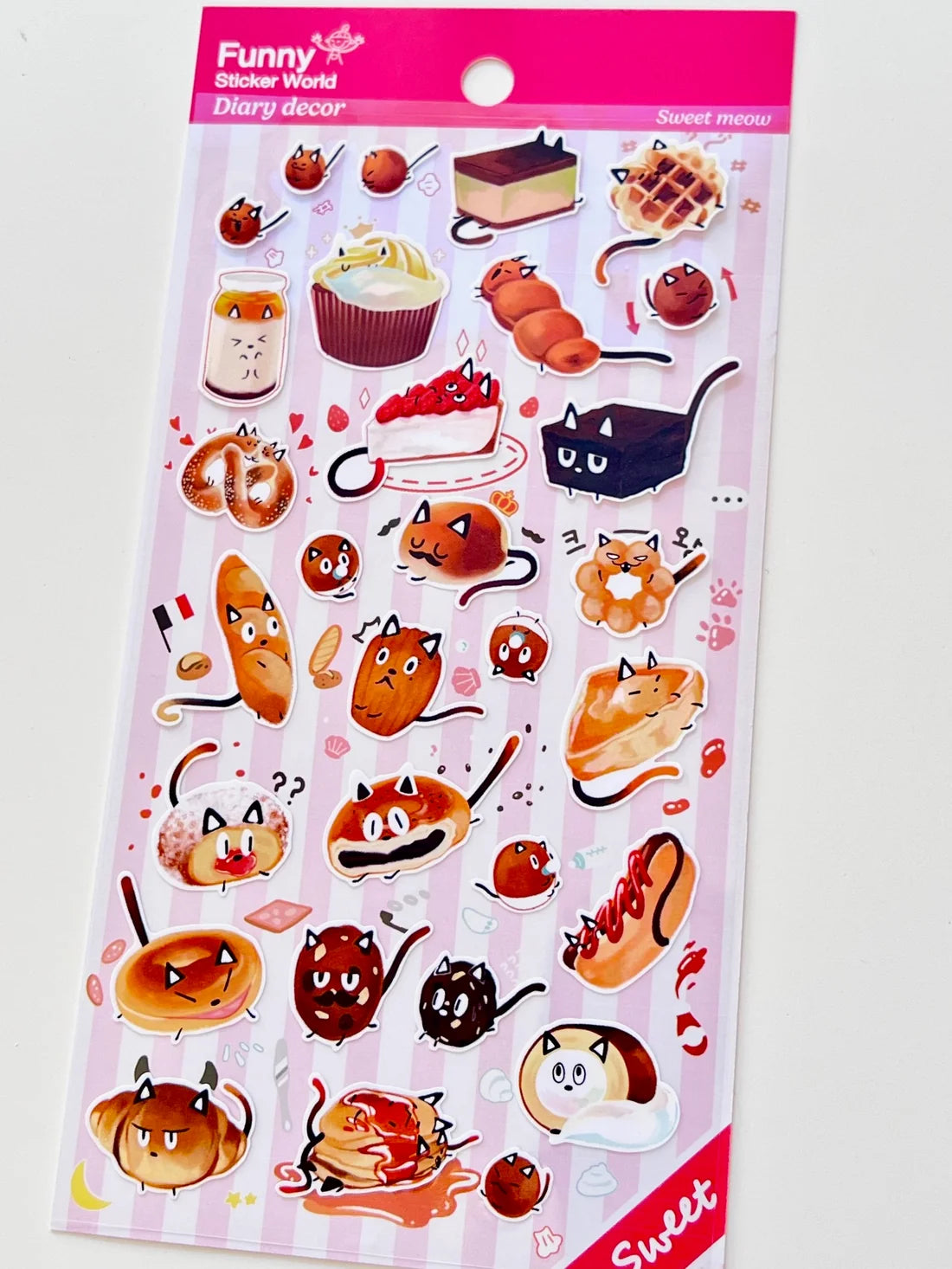 Funny Sticker World - Sweet Meow Sticker Sheet
Add a dash of delicious charm to your journal, planner, or happy mail with the sweet meow sticker sheet from Funny Sticker World. Featuring adorable dessert cat characters, this sheet brings a playful, cozy vibe to any creative project.
Sticker sheet
Includes 1 sticker sheet