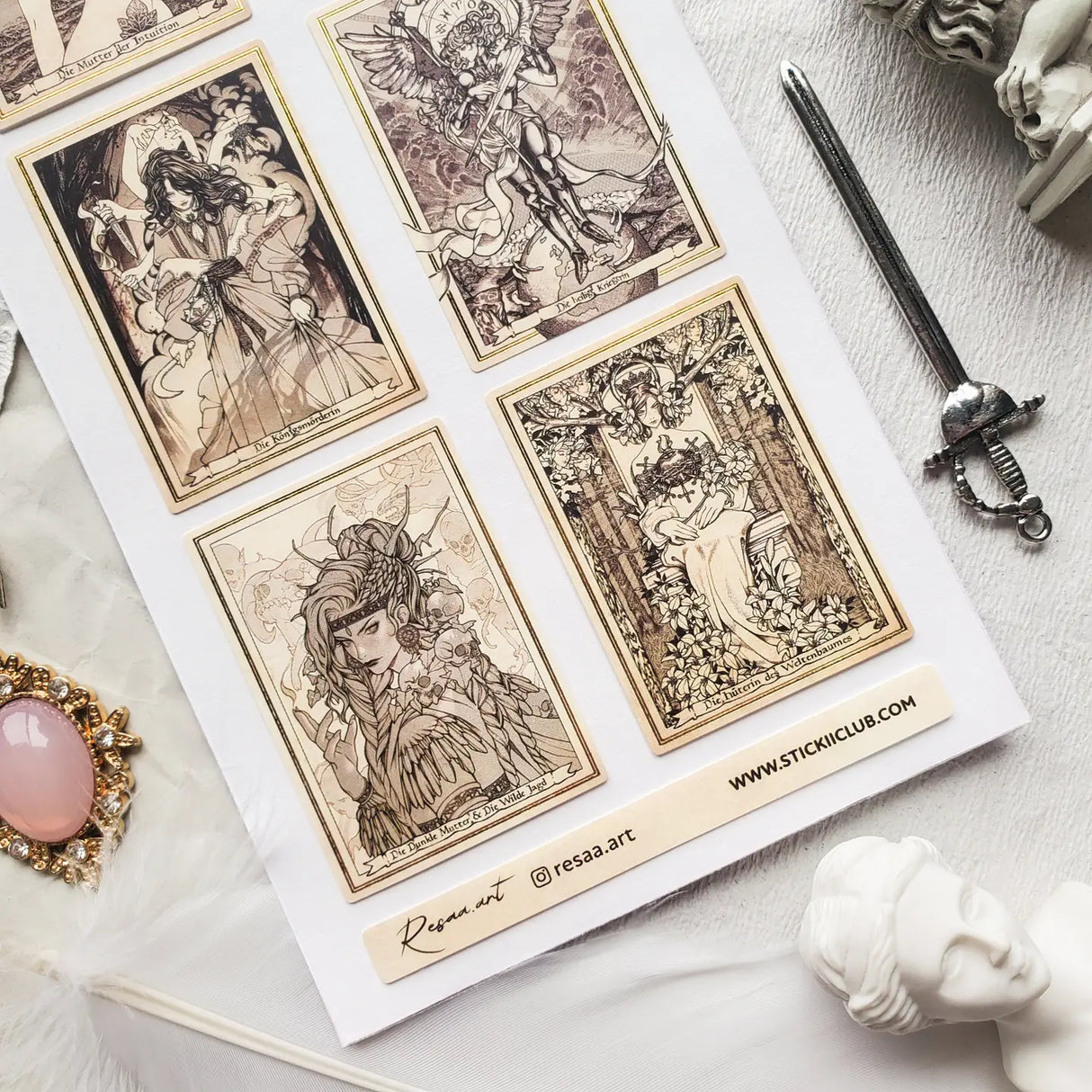 🌿⚔️ Enter @resaa.art’s mystical realm, where ethereal goddesses embody intuition, truth, and untamed power. Crowned in florals, framed by celestial symbols, and rooted in ancient myth, each divine being radiates magic and strength. This enchanting set invites you to embrace your inner oracle and walk the line between light and shadow.
Art by: @resaa.art