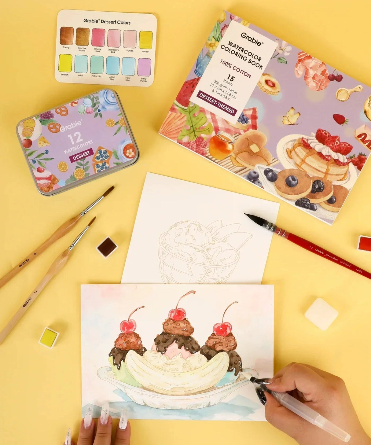 INDULGE YOUR CREATIVITY
Treat yourself to the sweetest watercolor adventure and build a colorful haven for your imagination. This delightful bundle comes with our custom 12-color Dessert palette and a whimsical coloring book featuring 15 pages of mouth-watering treats—from stacked pancakes and boba tea to elegant tiered cakes and delicate macarons. Bring these cozy, bakery-inspired scenes to life and watch your skills flourish!
A SWEET SETTING FOR CREATIVE ARTISTS
Embark on a delicious creative journey wit