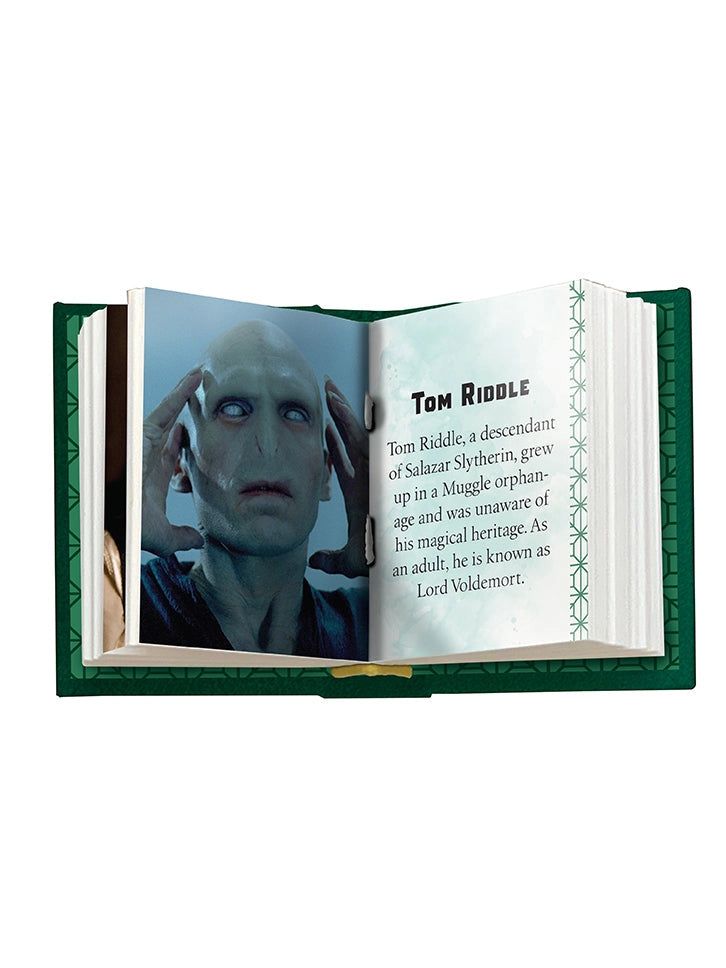 Go behind the scenes of the beloved Harry Potter films and discover all things Slytherin! Meet famous—and infamous—students and staff, explore key locations like the Chamber of Secrets, and learn everything there is to know about the house known for its cunning, ambition, and connection to the Dark Arts.
One of a new line of collectible pocket-size art books on the Harry Potter films, this book about Slytherin house features exciting artwork and behind-the-scenes facts in a fun, readable miniature size. F